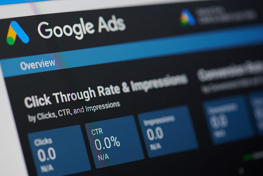 Laptop screen on google ads showing click through rate insights for ad